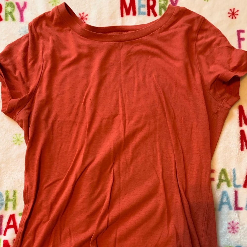 Missing reddish shirt